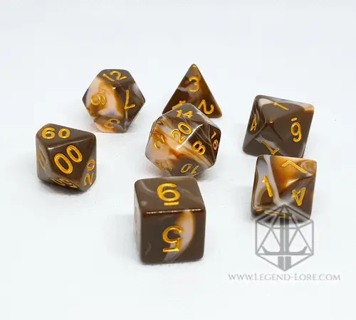 Chocolate RPG dice set: seven polyhedral dice in swirled brown and cream with gold numbers on a white background