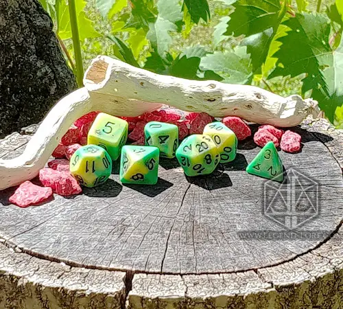 Infested Pond - RPG Dice Set 1 Infested Pond RPG dice set: seven green and yellow bicolor polyhedral dice on a tree stump with driftwood and red stones