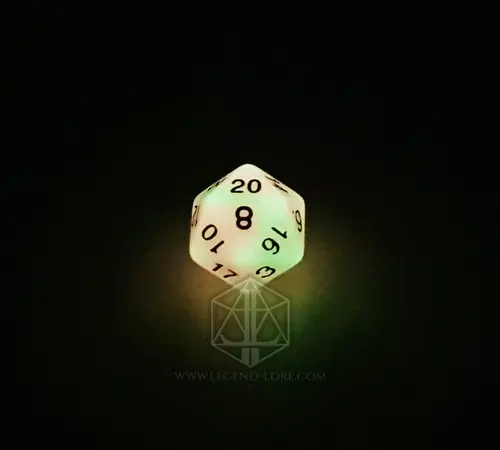 Persistent Twilight D20 glowing pale green and yellow in the dark, black numbers, Legend & Lore logo below