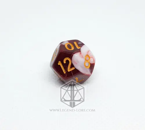 Single D12 from the Raspberry RPG dice set, dark red swirled with white, gold numbers, on a white background