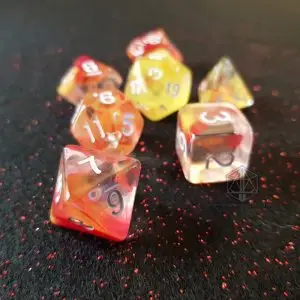 Fire Breath RPG dice set: seven semi-transparent red, orange and yellow polyhedral dice with white numbers on black glitter cloth