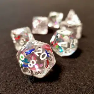 Alphabet RPG dice set: clear resin polyhedral dice with colourful letter inclusions and white numbers, D20 in front