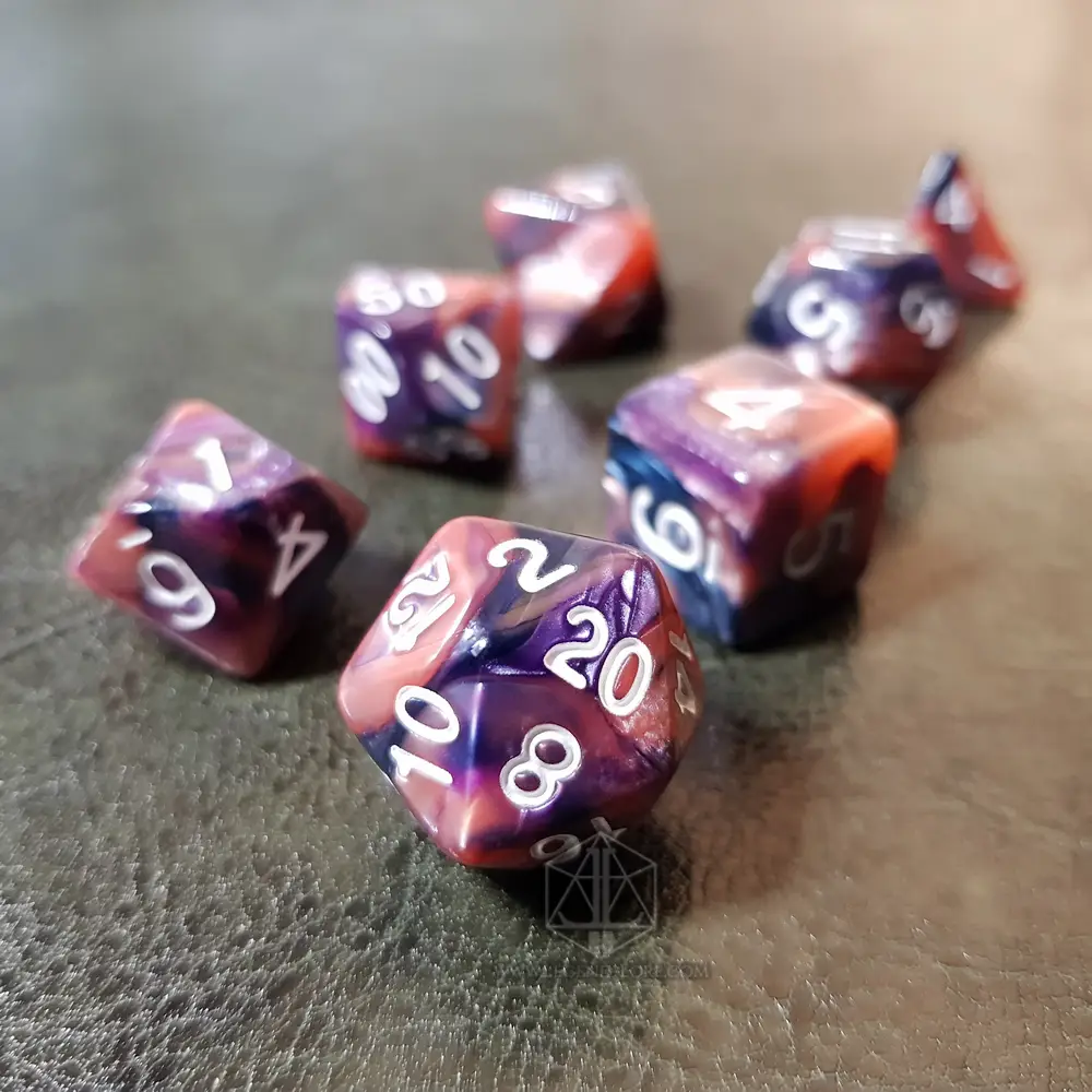 Cold Plasma RPG dice set of seven polyhedral dice swirled in coral pink, purple and blue with white numbers on leather
