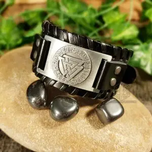 Black Valknut Viking Leather Bracelet with braided black strap and silver plate with Valknut and runes, beside hematite stones